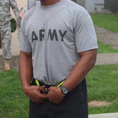 Soldier in Improved Physical Fitness Uniform (IPFU) with hands on PT belt
