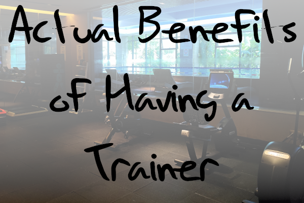 Dark weight room with 'Actual Benefits of a Personal Trainer' text