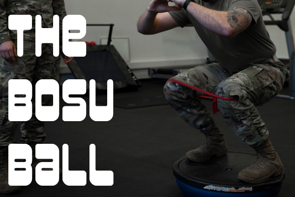 US Airman Does BOSU Ball Squat US Airman doing BOSU ball squat with knees banded