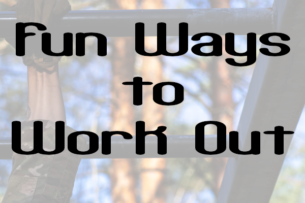 Soldier in uniform swinging from monkey bars