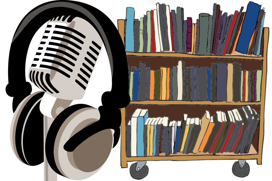 Headphones on a microphone and books